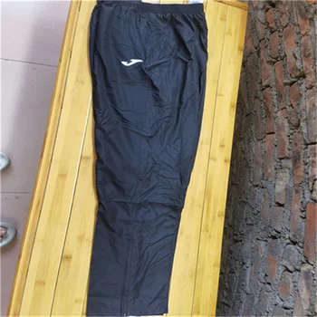 Мъжки тъкани ветроупорен спортни панталони от полиестер с вътрешната мрежа, мека 100% вътре, еднослоен черни мрежести джобове на ляво и на дясно